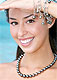 Woman with Tahitian pearl necklace and bracelet
